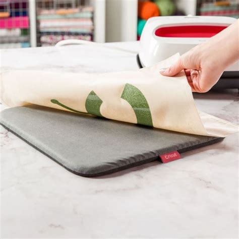 Cricut EasyPress Mat (30x30cm); Protect your surface area and achieve flawless iron-on applications with this essential 12" x 12" Cricut EasyPress™ companion; Designed to work with Cricut EasyPress™ for flawless iron-on transfers; Innovative construction eliminates moisture and directs heat to your iron-on design; Shields your work surface from damaging heat and moisture; Also perfect for pressing sewing projects